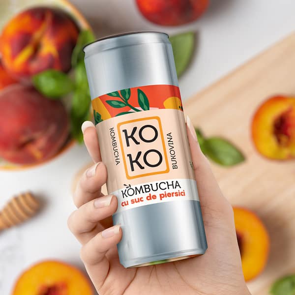 doza-kombucha-suc-piersici-naturalkombucha-cu-piersici-probiotice-sanatoase bautura-fermentata-aroma-piersici-dulci sticluta-kombucha-piersici-vitamine kombucha-organica-piersici-digestie