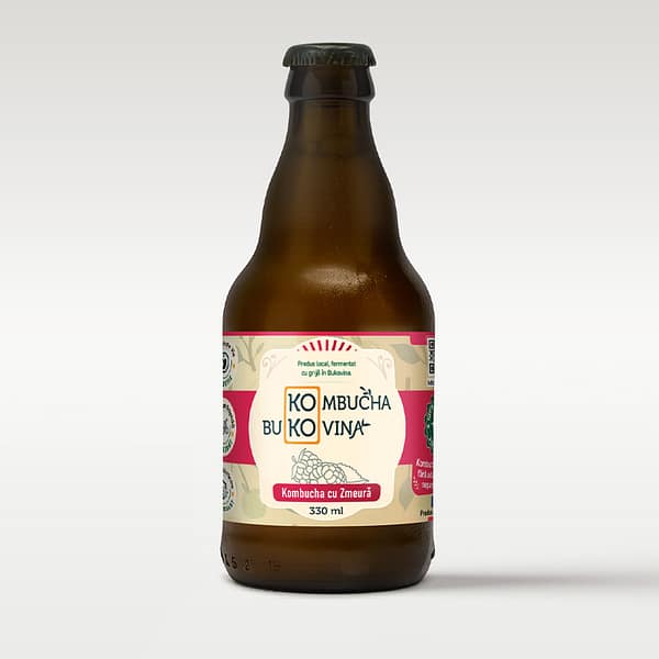 Sticlă de kombucha artizanală cu suc de zmeură, băutură probiotică naturală și răcoritoare